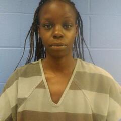 Mugshot of OMOLO, NELLY OSEWO