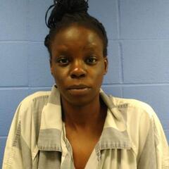 Mugshot of OMOLO, NELLY OSEWO 